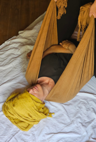Massaggio Rebozo su busto da donna